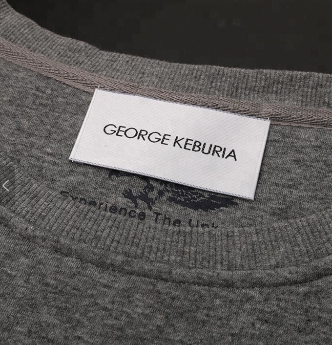 A tela personalizada corte do calor etiqueta etiquetas da roupa costura dentro para camisas do vestuário T